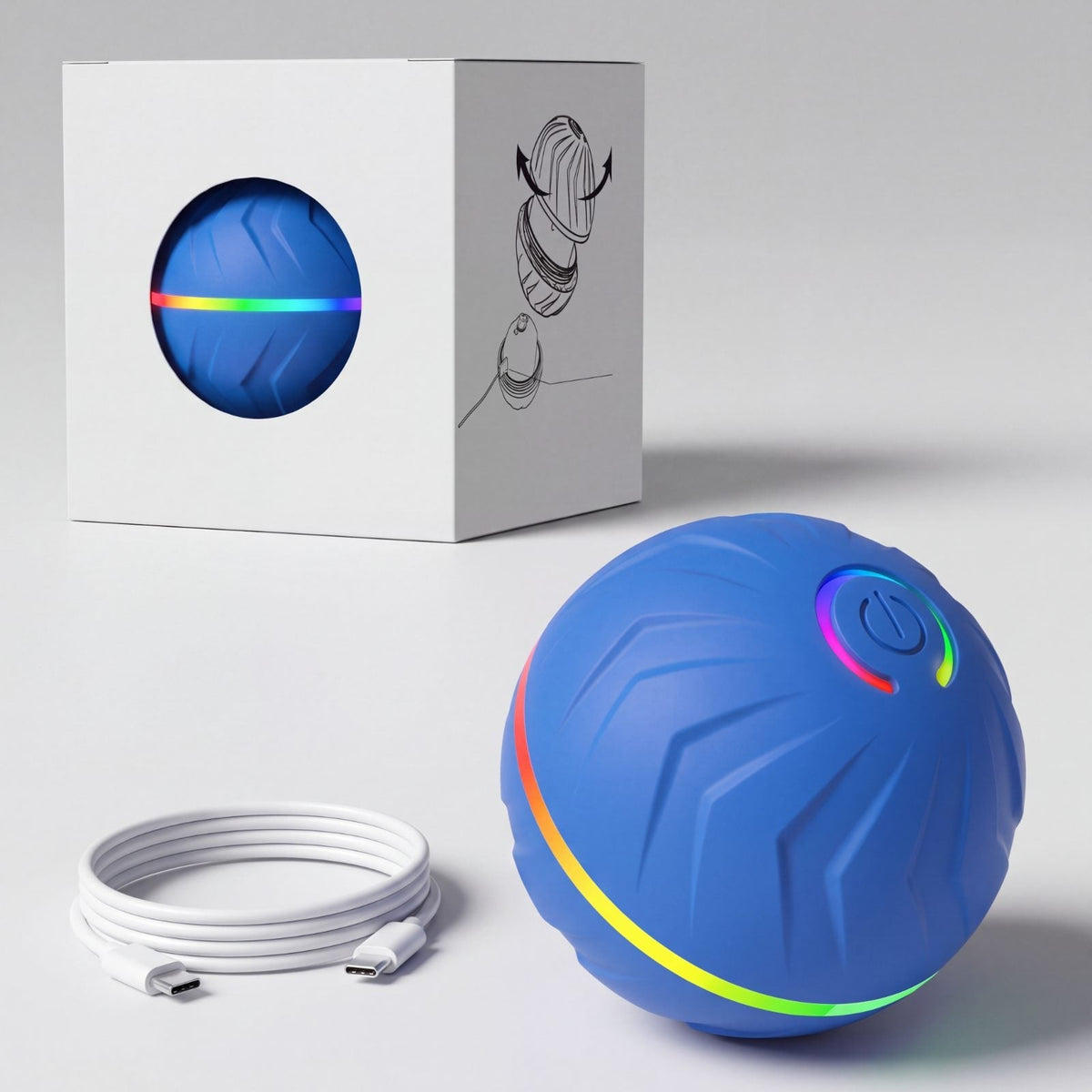 Balle pour chien rebondissante intelligente bleue avec sa boîte, anneau lumineux LED et câble de recharge USB-C, photo studio