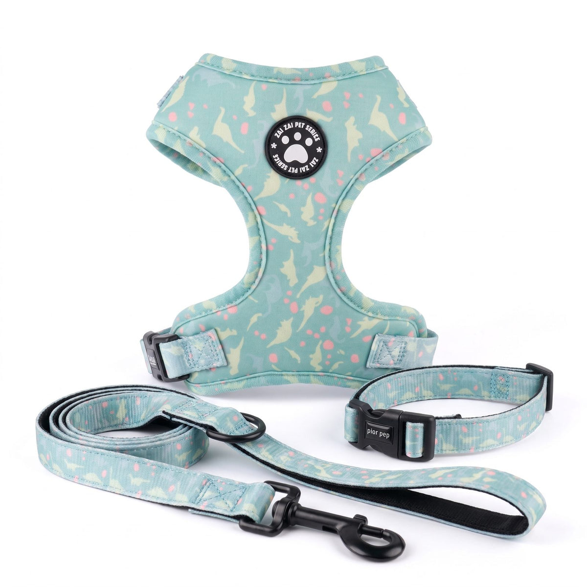 Harnais petit chien imprimé dinosaure - ensemble harnais, laisse et collier posés à plat