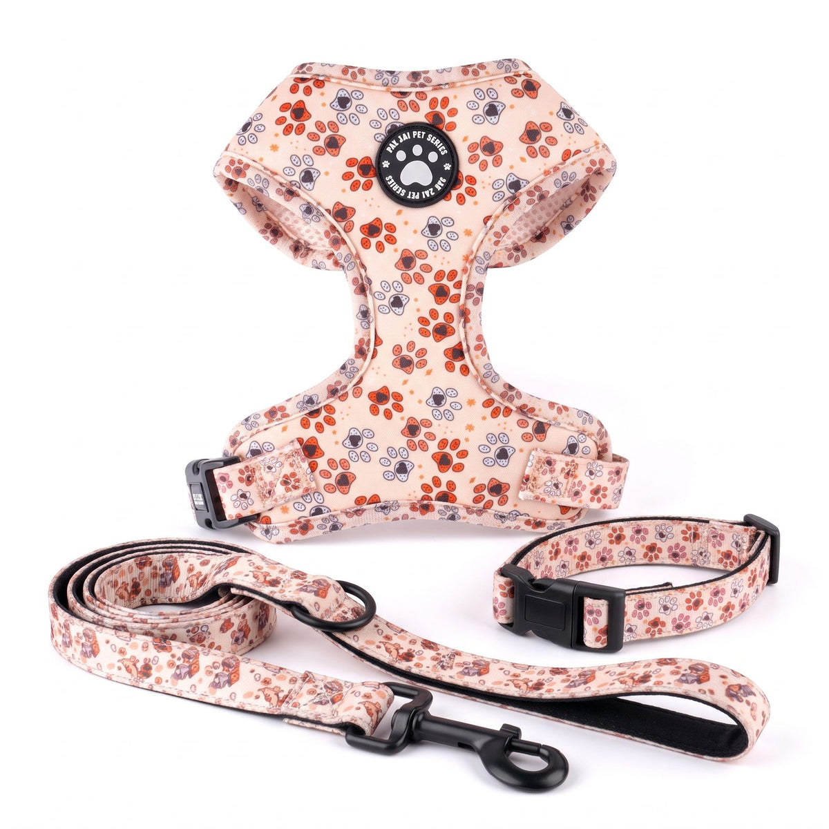 Ensemble harnais, laisse et collier pour petit chien imprimé empreintes de pattes, présentation du produit sur fond blanc