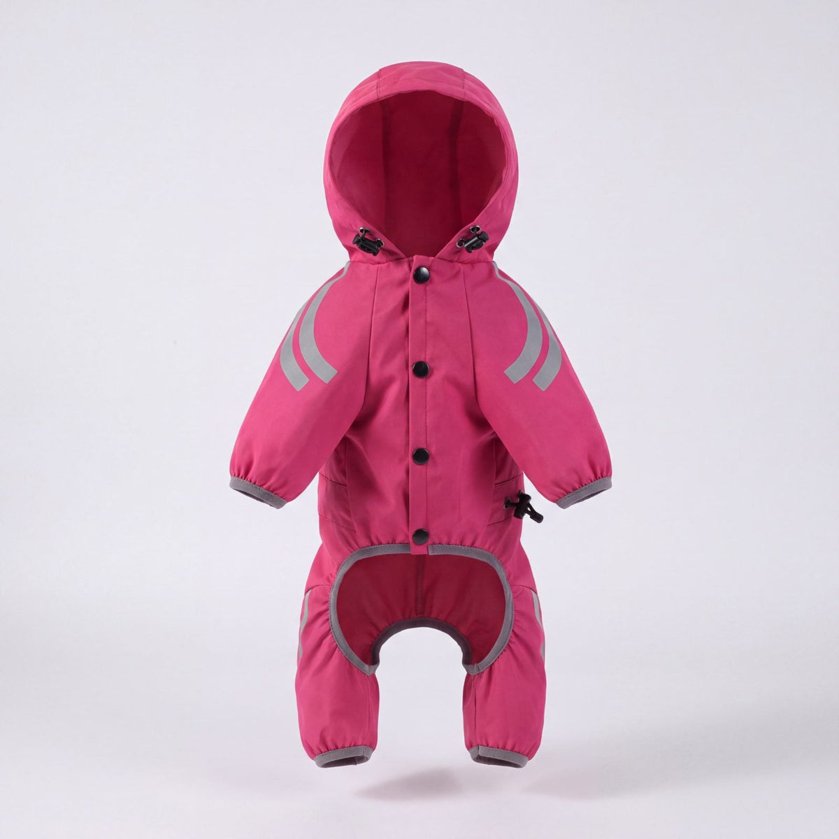Imperméable rose pour chien à capuche présenté seul de face, boutons-pression fermés, sur fond gris clair