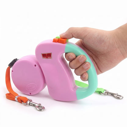 Laisse double rétractable pour deux chiens DuoChic modèle rose et menthe.
