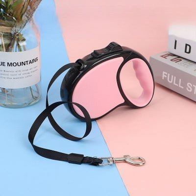 laisse enrouleur chien rose, design compact et leger, cordon durable Petdog™