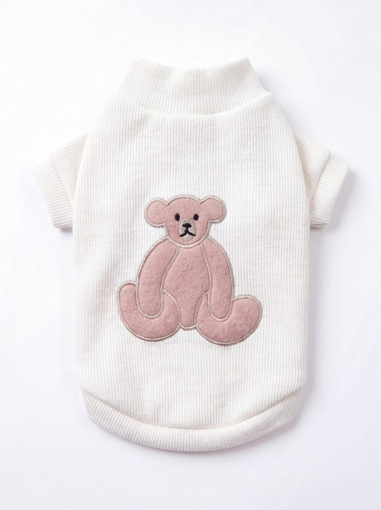 Pull pour chien blanc crème côtelé avec ourson appliqué dans le dos, vue de dos