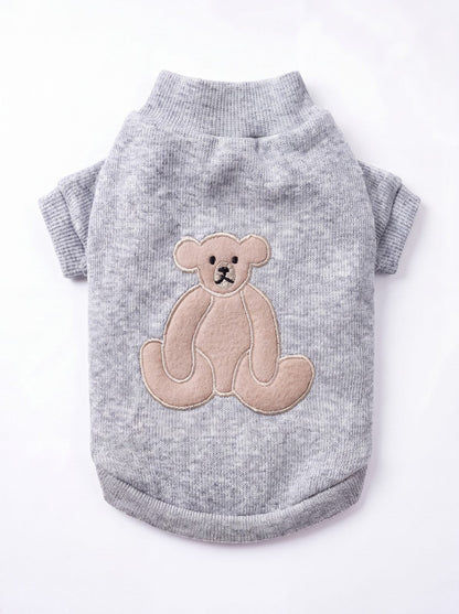 Pull pour chien gris côtelé avec ourson appliqué dans le dos, vue de dos