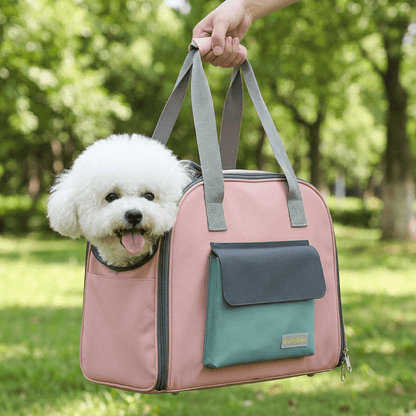 sac de transport pour chien convertible en tente FluffyBaby rose porte a la main bichon frise museau sorti par l'ouverture