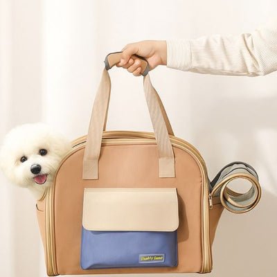 sac de transport pour chien beige et bleu, tête de bichon à l’ouverture latérale, porté à la main – FluffyBaby™
